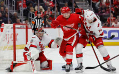 Mar 30, 2023; Detroit, Michigan, USA; Carolina Hurricanes goaltender Frederik Andersen (31) makes the save on Detroit Red Wings left wing Dominik Kubalik (81) in the second period at Little Caesars Arena. Mandatory Credit: Rick Osentoski-USA TODAY Sports