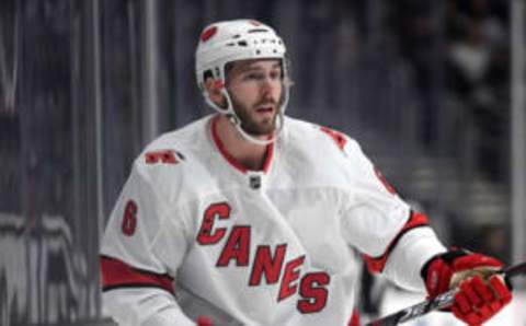 LOS ANGELES, CALIFORNIA – OCTOBER 15: Joel Edmundson #6 of the Carolina Hurricanes watches play during a 2-0 Hurricanes win over the Los Angeles Kings at Staples Center on October 15, 2019 in Los Angeles, California. (Photo by Harry How/Getty Images)