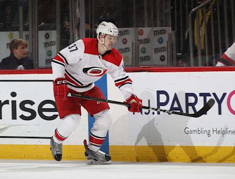 NEWARK, NJ – MARCH 27: Warren Foegele #37 of the Carolina Hurricanes skates against the New Jersey Devils at the Prudential Center on March 27, 2018 in Newark, New Jersey. (Photo by Bruce Bennett/Getty Images)