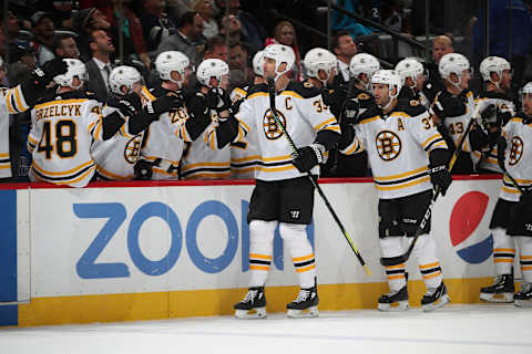 DENVER, COLORADO – OCTOBER 10: Zdeno Chara #33 of the Boston Bruins celebrates with his bench after scoring a goal against the Colorado Avalanche at Pepsi Center on October 10, 2019 in Denver, Colorado. (Photo by Michael Martin/NHLI via Getty Images)