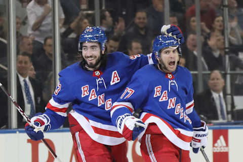 Tony DeAngelo #77 of the New York Rangers (R) celebrates his hat trick goal . (Photo by Bruce Bennett/Getty Images)