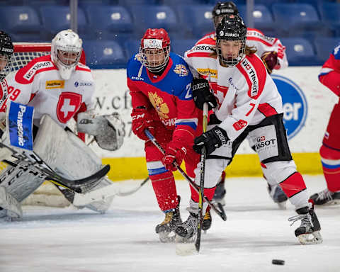 PLYMOUTH, MI – DECEMBER 11: Noah Meier #7 of the Switzerland Nationals battles for position with Alexandr Kisakov #21 of the U17 Russian Nationals during the 2018 Under-17 Four Nations Tournament game at USA Hockey Arena on December 11, 2018 in Plymouth, Michigan. Russia defeated Switzerland 9-1. (Photo by Dave Reginek/Getty Images)