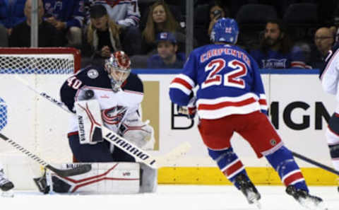 NEW YORK, NEW YORK – OCTOBER 23: Daniil Tarasov #40 of the Columbus Blue Jackets makes the first period save on Ryan Carpenter #22 of the New York Rangers at Madison Square Garden on October 23, 2022 in New York City. (Photo by Bruce Bennett/Getty Images)