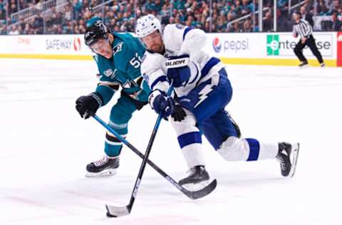 SAN JOSE, CA – JANUARY 05: San Jose Sharks left wing Lukas Radil (52) and Tampa Bay Lightning defenseman Anton Stralman (6) battle for the puck during the San Jose Sharks game versus the Tampa Bay Lightning on January 5, 2019, at SAP Center in San Jose, CA (Photo by Matt Cohen/Icon Sportswire via Getty Images)