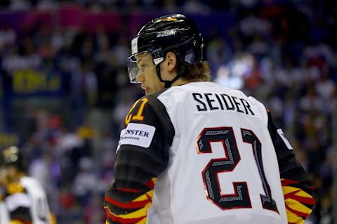 KOSICE, SLOVAKIA – MAY 15: Moritz Seider of Germany looks on during the 2019 IIHF Ice Hockey World Championship Slovakia group A game between Germany and Slovakia at Steel Arena on May 15, 2019, in Kosice, Slovakia. (Photo by Martin Rose/Getty Images)