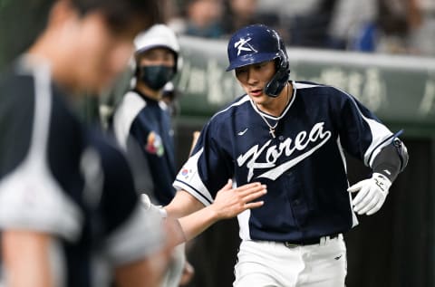 Ha Seong Kim of Team Korea hits a grand slam at the top of the 5th inning during the World Baseball Classic Pool B game between Korea and China at Tokyo Dome. (Photo by Gene Wang/Getty Images)