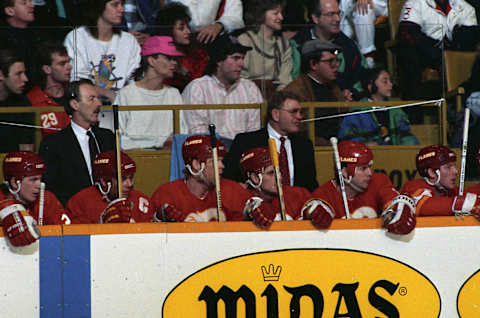 TORONTO, ON – JANUARY 13: Head coach Terry Crisp (right) and Assistant coach Dave King (left) of the Calgary Flames watch the play develop against the Toronto Maple Leafs during NHL game action January 13, 1990 at Maple Leaf Gardens in Toronto, Ontario, Canada. Toronto defeated Calgary 6-5. (Photo by Graig Abel/Getty Images)