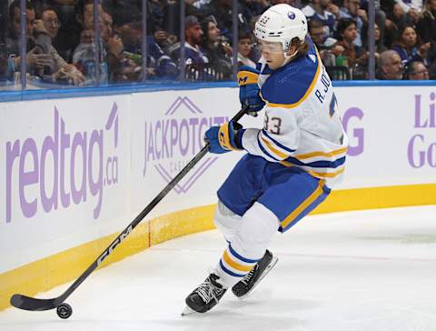 TORONTO, CANADA – NOVEMBER 4: Ryan Johnson #33 of the Buffalo Sabres skates with the puck in his first NHL game against the Toronto Maple Leafs during the second period at Scotiabank Arena on November 4, 2023 in Toronto, Ontario, Canada. (Photo by Claus Andersen/Getty Images)