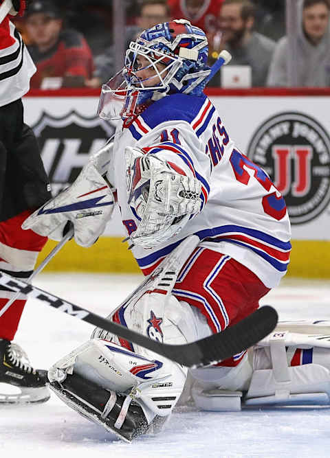 CHICAGO, ILLINOIS – FEBRUARY 19: Igor Shesterkin #31 of the New York Rangers makes a glove save against the Chicago Blackhawks at the United Center on February 19, 2020 in Chicago, Illinois. (Photo by Jonathan Daniel/Getty Images)