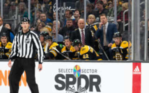 BOSTON, MA – SEPTEMBER 27: Jim Montgomery and Joe Sacco of the Boston Bruins stand behind the bench during a preseason game against the New York Rangers during the second period at the TD Garden on September 27, 2022 in Boston, Massachusetts. The Bruins won 3-2 in overtime. (Photo by Richard T Gagnon/Getty Images)