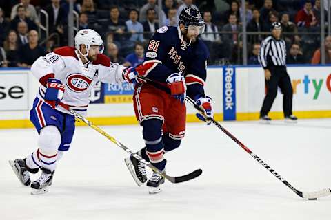 Feb 21, 2017; New York, NY, USA; New York Rangers right wing Rick Nash (61) controls the puck in front of Montreal Canadiens defenseman Andrei Markov (79) during overtime at Madison Square Garden. Mandatory Credit: Adam Hunger-USA TODAY Sports