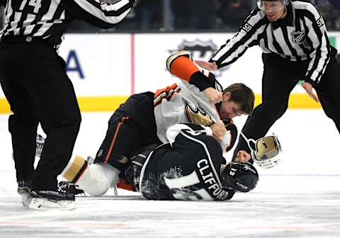 LOS ANGELES, CA – JANUARY 13: Anaheim Ducks Left Wing Nick Ritchie (37) fights with Los Angeles Kings Left Wing Kyle Clifford (13) and shoves him to the ice during an NHL game between the Anaheim Ducks and the Los Angeles Kings on January 13, 2018, at STAPLES Center in Los Angeles, CA. (Photo by Chris Williams/Icon Sportswire via Getty Images)