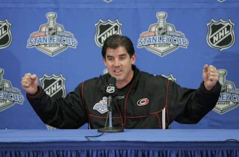 RALEIGH, NC – JUNE 6: Coach Peter Laviolette of the Carolina Hurricanes addresses the media the day after his team’s game one victory in the NHL Stanley Cup Finals June 6, 2006, at the RBC Center in Raleigh, North Carolina. (Photo by Bruce Bennett/Getty Images)