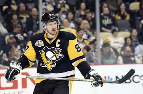 NHL Mid-Season Awards: Pittsburgh Penguins center Sidney Crosby (87) looks on against the Boston Bruins during the second period at the PPG PAINTS Arena. The Penguins won 4-3 in overtime. Mandatory Credit: Charles LeClaire-USA TODAY Sports