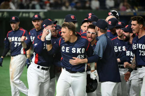 Martin Muzik (49) of the Czech Republic celebrates with teammates after hitting a three run home run to make it 7-5 in the ninth inning against China. (Photo by Kenta Harada/Getty Images)