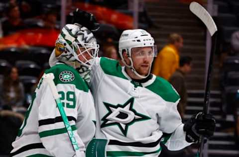 ANAHEIM, CALIFORNIA – MARCH 29: Jake Oettinger #29 and Radek Faksa #12 of the Dallas Stars celebrate a win against the Anaheim Ducks at Honda Center on March 29, 2022 in Anaheim, California. (Photo by Ronald Martinez/Getty Images)