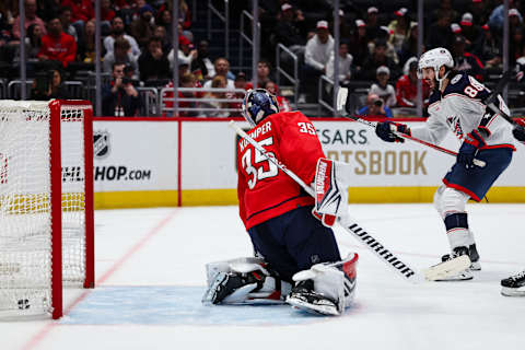 WASHINGTON, DC – OCTOBER 07: Kirill Marchenko #86 of the Columbus Blue Jackets reacts after recording an assist on the eventual game-winning goal by teammate Adam Fantilli #11 against Darcy Kuemper #35 of the Washington Capitals during the third period of the NHL preseason game at Capital One Arena on October 7, 2023 in Washington, DC. (Photo by Scott Taetsch/Getty Images)