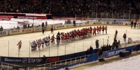 Colorado Avalanche alumni line up to shake hands with Detroit Red Wings alumni. Photo credit: Nadia Archuleta