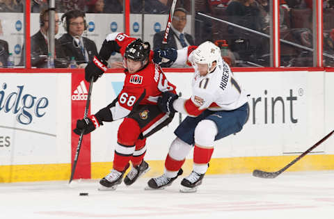 OTTAWA, ON – MARCH 29: Mike Hoffman #68 of the Ottawa Senators battles for position against Jonathan Huberdeau #11 of the Florida Panthers at Canadian Tire Centre on March 29, 2018 in Ottawa, Ontario, Canada. (Photo by Andre Ringuette/NHLI via Getty Images)