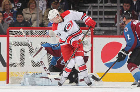 DENVER, CO – OCTOBER 21: Elias Lindholm #16 of the Carolina Hurricanes screens a shot in front of Goaltender Semyon Varlamov #1 during the game against the Colorado Avalanche at the Pepsi Center on October 21, 2015 in Denver, Colorado. (Photo by Michael Martin/NHLI via Getty Images)