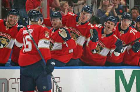 SUNRISE, FL – APRIL 5: Teammates congratulate Aleksander Barkov