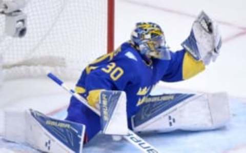 Sep 20, 2016; Toronto, Ontario, Canada; Team Sweden goalie Henrik Lundqvist (30) makes a save against Team Finland during preliminary round play in the 2016 World Cup of Hockey at Air Canada Centre. Mandatory Credit: Dan Hamilton-USA TODAY SportsThe third period followed the same flow as the second, the Fins on the attack, while Sweden relied on Lundqvist to bail them out. Lundqvist made the saves he had to, to keep it a one-goal game. He also made some saves in the closing minutes that had the opposing players looking up to the rafters.