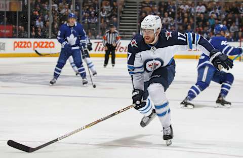 TORONTO, ON – MARCH 31: Adam Lowry #17 of the Winnipeg Jets s. (Photo by Claus Andersen/Getty Images).