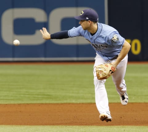 ST. PETERSBURG, FL – SEPTEMBER 16: Brandon Lowwe #35 of the Tampa Bay Rays flips the ball to second base to begin a successful double play in the eighth inning of the game against the Oakland Athletics at Tropicana Field on September 16, 2018 in St. Petersburg, Florida. (Photo by Joseph Garnett Jr./Getty Images)