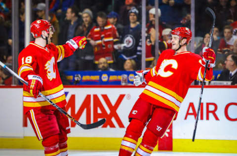 Dec 10, 2016; Calgary, Alberta, CAN; Calgary Flames center Lance Bouma (right) celebrates his goal with center Matt Stajan (18) against the Winnipeg Jets during the third period at Scotiabank Saddledome. Calgary won 6-2. Mandatory Credit: Sergei Belski-USA TODAY Sports