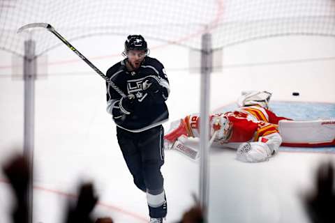 LOS ANGELES, CALIFORNIA – DECEMBER 22: Adrian Kempe #9 of the Los Angeles Kings celebrates the game-winning goal against Dan Vladar #80 of the Calgary Flames in overtime at Crypto.com Arena on December 22, 2022, in Los Angeles, California. (Photo by Ronald Martinez/Getty Images)