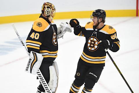 BOSTON, MA – OCTOBER 26: Tuukka Rask #40 and David Pastrnak #88 of the Boston Bruins celebrate the win against the St. Louis Blues at the TD Garden on October 26, 2019 in Boston, Massachusetts. (Photo by Steve Babineau/NHLI via Getty Images)