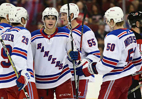 NEWARK, NJ – SEPTEMBER 23: New York Rangers defensemen Brandon Crawley (73) is congratulated by teammates after scoring a goal during a preseason NHL game between the New Jersey Devils and New York Rangers on September 23, 2017 at Prudential Center in Newark, NJ. The Devils defeated the Rangers 2-1.(Photo by Nick Wosika/Icon Sportswire via Getty Images)