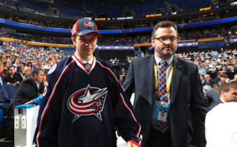 BUFFALO, NY – JUNE 25: Andrew Peeke reacts after being selected 34th overall by the Columbus Blue Jackets during the 2016 NHL Draft on June 25, 2016 in Buffalo, New York. (Photo by Bruce Bennett/Getty Images)