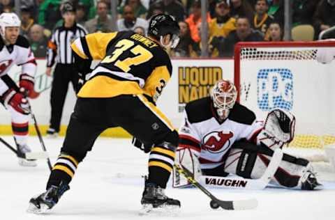 PITTSBURGH, PA: Pittsburgh Penguins Center Carter Rowney (37) scores his first NHL career goal during the third period on 2017. (Photo by Jeanine Leech/Icon Sportswire via Getty Images)