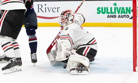 BOSTON, MA – MARCH 18: Devon Levi #1 of the Northeastern Huskies makes a save during the second period against the Connecticut Huskies during NCAA men’s hockey in the Hockey East Championship semifinal at TD Garden on March 18, 2022 in Boston, Massachusetts. (Photo by Richard T Gagnon/Getty Images)