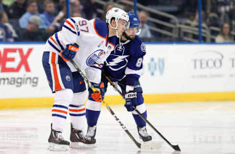 ST. PETERSBURG, FL – FEBRUARY 21: Edmonton Oilers center Connor McDavid (97) and Tampa Bay Lightning right wing Nikita Kucherov (86) get set for puck drop in the third period of the NHL game between the Edmonton Oilers and Tampa Bay Lightning on February 21, 2017, at Amalie Arena in Tampa, FL. (Photo by Mark LoMoglio/Icon Sportswire via Getty Images)