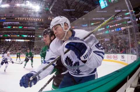 Jan 31, 2017; Dallas, TX, USA; Dallas Stars defenseman Stephen Johns (28) checks Toronto Maple Leafs left wing Matt Martin (15) during the second period at the American Airlines Center. Mandatory Credit: Jerome Miron-USA TODAY Sports