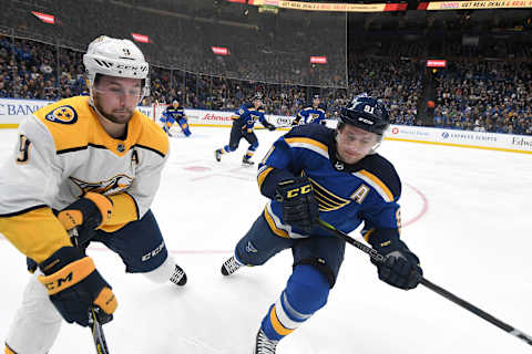 ST. LOUIS, MO – DECEMBER 27: Nashville Predators leftwing Filip Forsburg (9) and St. Louis Blues right wing Vladimir Tarasenko (91) go after a loose puck on the boards in the first period during a NHL game between the Nashville Predators and the St. Louis Blues on December 27, 2017, at Scottrade Center, St. Louis, MO. Nashville won, 2-1. (Photo by Keith Gillett/Icon Sportswire via Getty Images)