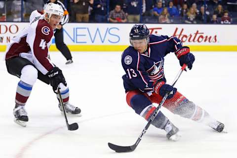 Nov 21, 2016; Columbus, OH, USA; Colorado Avalanche defenseman Tyson Barrie (4) defends against Columbus Blue Jackets right wing Cam Atkinson (13) in the overtime period at Nationwide Arena. The Avalanche won 3-2. Mandatory Credit: Aaron Doster-USA TODAY Sports