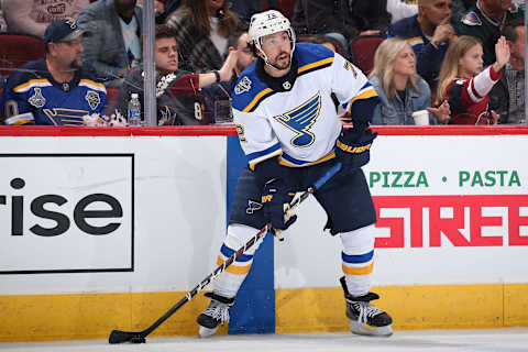 GLENDALE, ARIZONA – DECEMBER 31: Justin Faulk #72 of the St. Louis Blues looks to pass during the NHL game aph at Gila River Arena on December 31, 2019 in Glendale, Arizona. The Coyotes defeated the Blues 3-1. (Photo by Christian Petersen/Getty Images)