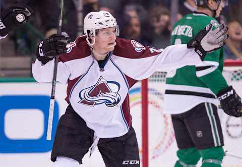 Feb 3, 2015; Dallas, TX, USA; Colorado Avalanche center Nathan MacKinnon (29) celebrates a goal against the Dallas Stars during the game at the American Airlines Center. The Avalanche defeat the Stars 3-2 in the overtime shootout. Mandatory Credit: Jerome Miron-USA TODAY Sports