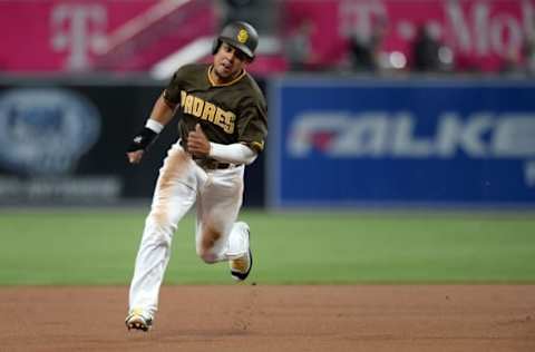 Sep 23, 2016; San Diego, CA, USA; San Diego Padres center fielder Jon Jay (24) runs to third on a double by third baseman Carlos Asuaje (no tpictured) during the first inning against the San Francisco Giants at Petco Park. Mandatory Credit: Jake Roth-USA TODAY Sports