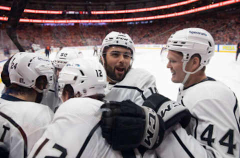 Phillip Danault #24, Sean Durzi #50, Los Angeles Kings, Stanley Cup Playoffs (Photo by Codie McLachlan/Getty Images)