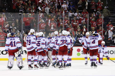 NEWARK, NEW JERSEY – MAY 01: The New York Rangers pause following their 4-0 defeat at the hands of the New Jersey Devils in Game Seven of the First Round of the 2023 Stanley Cup Playoffs at Prudential Center on May 01, 2023, in Newark, New Jersey. (Photo by Bruce Bennett/Getty Images)