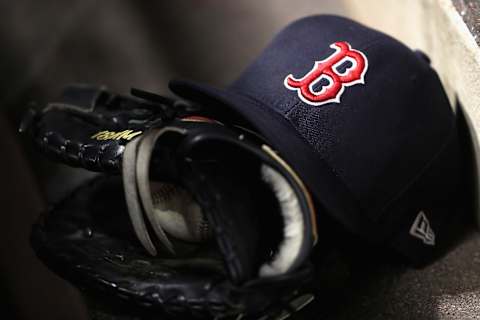 ANAHEIM, CA – APRIL 18: A detail of a Boston Red Sox hat and glove during a game against the Los Angeles Angels of Anaheim at Angel Stadium on April 18, 2018 in Anaheim, California. (Photo by Sean M. Haffey/Getty Images)