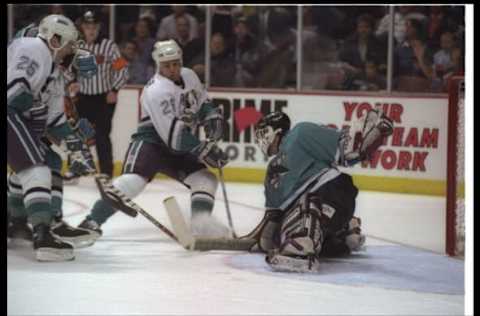 19 Dec 1995: Goaltender Chris Terreri of the San Jose Sharks (right) defends the goal during a game against the Anaheim Mighty Ducks at Arrowhead Pond in Anaheim, California. The Sharks won the game, 7-4.