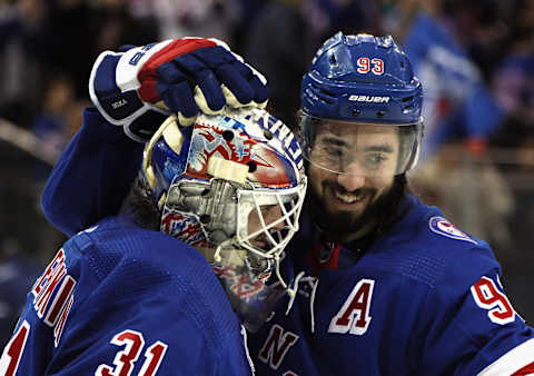 Igor Shesterkin #31 and Mika Zibanejad #93 of the New York Rangers. (Photo by Bruce Bennett/Getty Images)