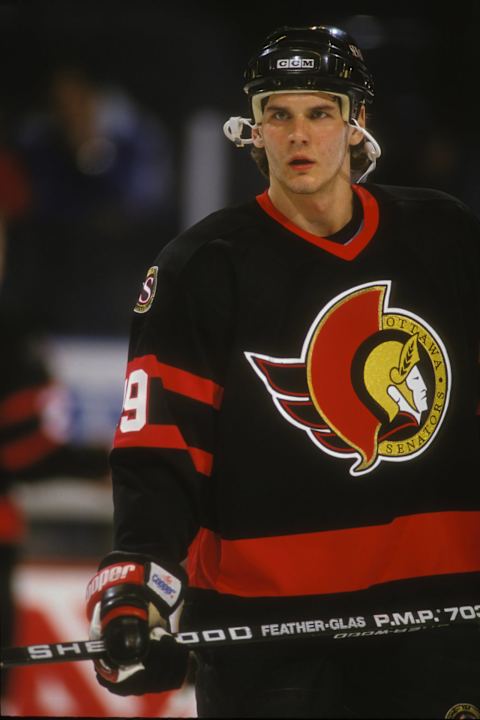 LANDOVER, MD – DECEMBER 17: Alexei Yashin #19 of the Ottawa Senators looks on during a NHL hockey game against the Washington Capitals on December 17, 1993 at USAir Arena in Landover, Maryland. (Photo by Mitchell Layton/Getty Images)