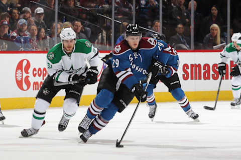 DENVER, CO – NOVEMBER 29: Nathan MacKinnon #29 of the Colorado Avalanche skates with the puck as he is pursued by Tyler Seguin #91 of the Dallas Stars at the Pepsi Center on November 29, 2014 in Denver, Colorado. (Photo by Michael Martin/NHLI via Getty Images)