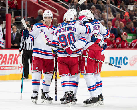 DETROIT, MI – NOVEMBER 09: Neal Pionk #44 of the New York Rangers celebrates his second period goal with teammates Chris Kreider #20, Vladislav Namestnikov #90 and Mika Zibanejad #93 during an NHL game against the Detroit Red Wings at Little Caesars Arena on November 9, 2018 in Detroit, Michigan. (Photo by Dave Reginek/NHLI via Getty Images)